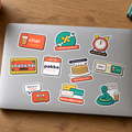 Desi Dev Sticker Pack: all ten stickers, including Chai > Coffee, Jugaad Engineer and Kal se pakka, on a silver laptop lid.