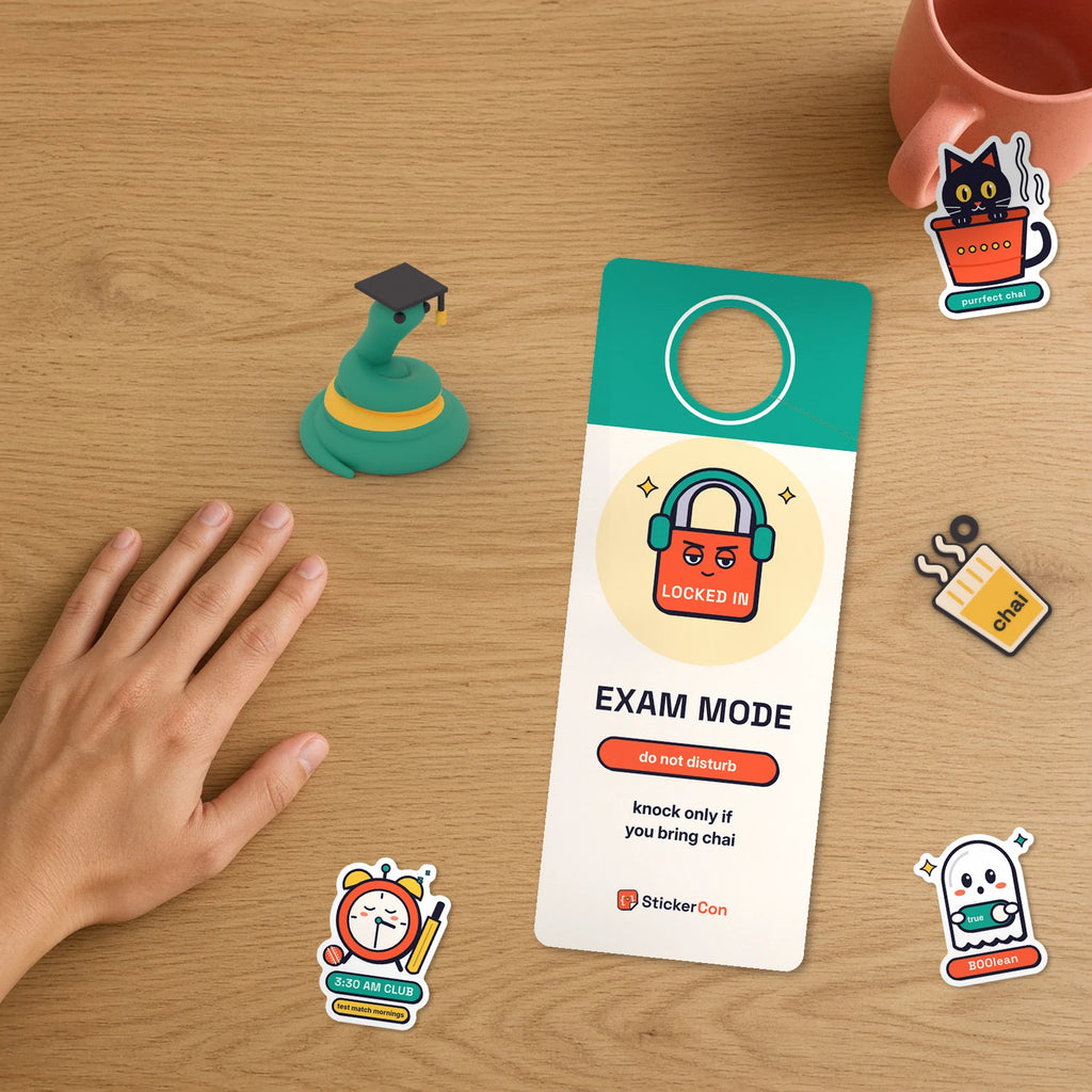 Exam Mode Study Set on a desk: Graduate Pip, chai keychain, New Drops stickers and two-sided Exam Mode door hanger