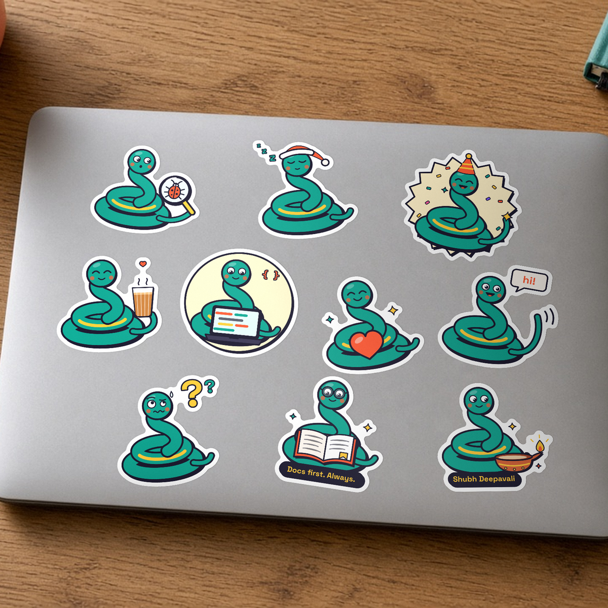 Pip Sticker Pack: all ten Pip the snake stickers, including Docs first. Always. and Shubh Deepavali, on a silver laptop lid.