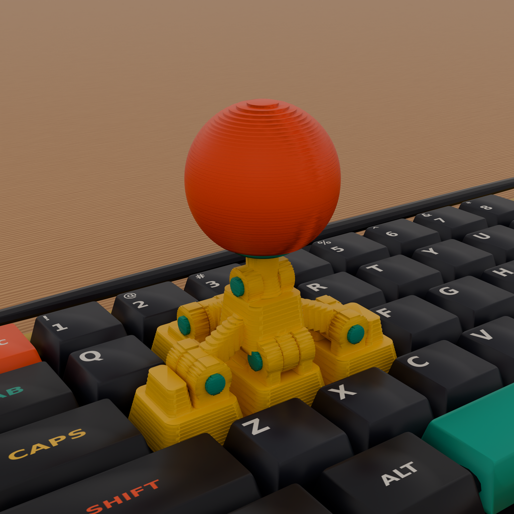 Macro photo of the 3D-printed articulated 4-hinge WASD Arcade Stick Keycap Rig with yellow keycap base blocks, teal hinge pins and a coral ball-top on a dark mechanical keyboard on an oak desk